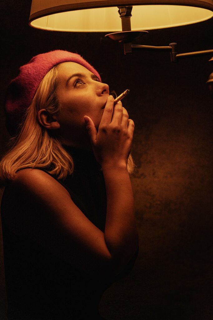 woman, cigarette, smoking, smoke, lamp, light, cinematic, lighting, moody, dark, cinematic, cinematic, cinematic, cinematic, cinematic